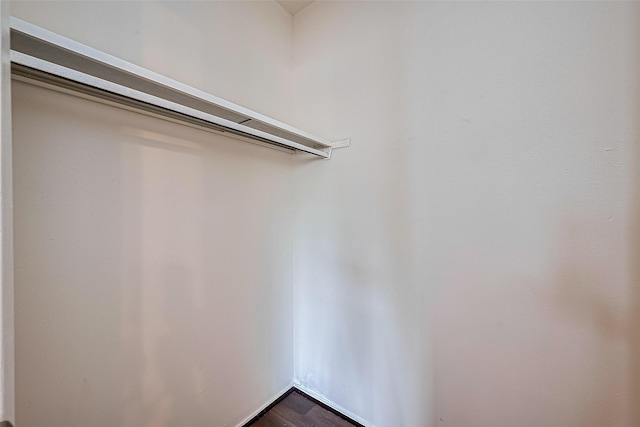 4330 Brookhead Trl, Houston, TX 77066 - spacious closet with dark wood-style flooring
