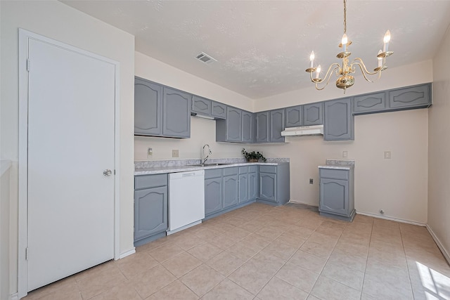 4330 Brookhead Trl, Houston, TX 77066 - kitchen with dishwasher, under cabinet range hood, a chandelier, gray cabinetry, and light tile patterned flooring