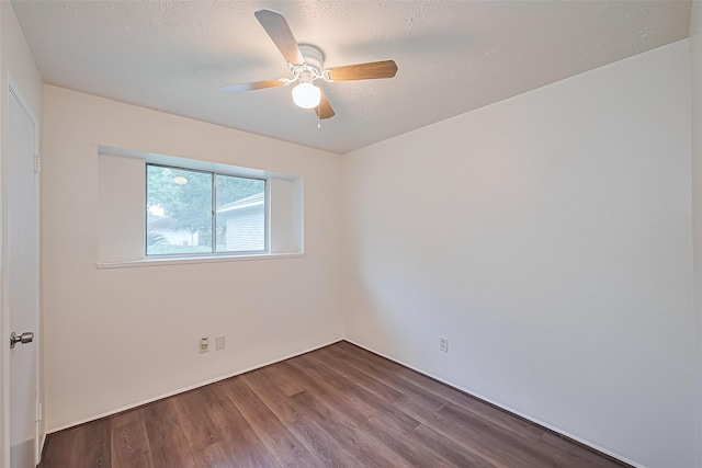4330 Brookhead Trl, Houston, TX 77066 - empty room with dark wood-style flooring and ceiling fan