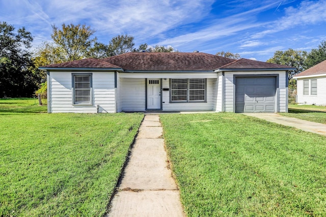 2003 Amelia St, Baytown, TX 77520 - ranch-style house featuring a front yard, concrete driveway, a garage, and a porch