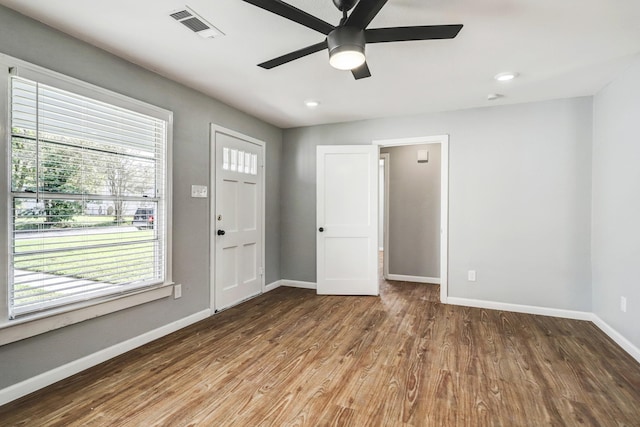 2003 Amelia St, Baytown, TX 77520 - entryway featuring healthy amount of natural light, wood finished floors, a ceiling fan, and recessed lighting