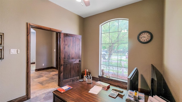1804 Esther Dr, Houston, TX 77088 - office area featuring ceiling fan and stone finish floors