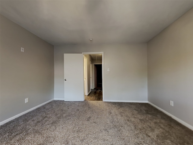 1402 Cherry Springs Ct, Missouri City, TX 77459 - carpeted spare room featuring attic access and baseboards