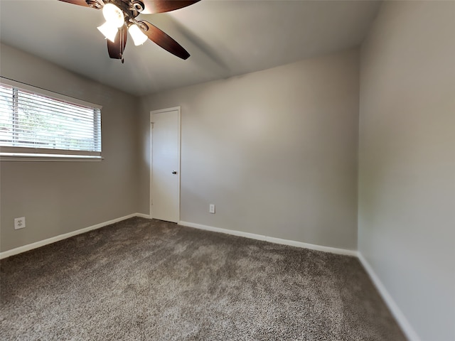 1402 Cherry Springs Ct, Missouri City, TX 77459 - empty room featuring dark carpet and ceiling fan