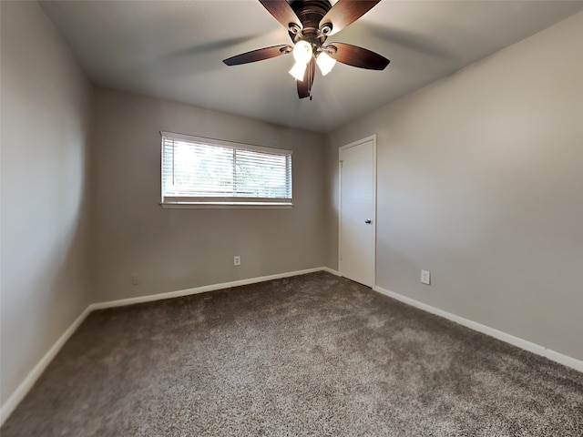 1402 Cherry Springs Ct, Missouri City, TX 77459 - spare room with dark carpet and a ceiling fan