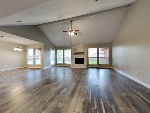 1402 Cherry Springs Ct, Missouri City, TX 77459 - unfurnished living room with ceiling fan, dark wood-style floors, a chandelier, beam ceiling, and a brick fireplace