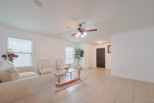 18231 Rexine Ln, Cypress, TX 77433 - living area featuring a ceiling fan, light tile patterned floors, and crown molding