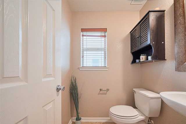 18231 Rexine Ln, Cypress, TX 77433 - bathroom featuring toilet and a sink