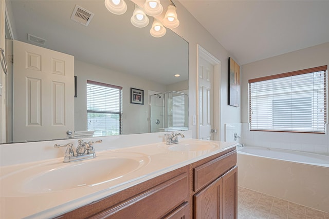 18231 Rexine Ln, Cypress, TX 77433 - full bath featuring a garden tub, a shower stall, and double vanity