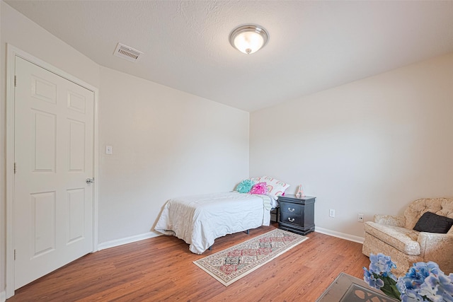 18231 Rexine Ln, Cypress, TX 77433 - bedroom with light wood-style flooring and baseboards