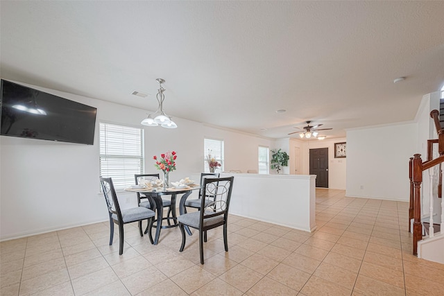 18231 Rexine Ln, Cypress, TX 77433 - dining area with stairs, light tile patterned flooring, healthy amount of natural light, and a ceiling fan