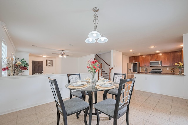 18231 Rexine Ln, Cypress, TX 77433 - dining room with stairway, light tile patterned floors, a ceiling fan, and recessed lighting