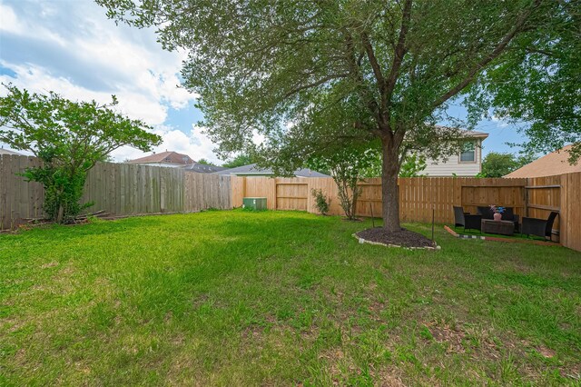 18231 Rexine Ln, Cypress, TX 77433 - fenced backyard with an outdoor hangout area