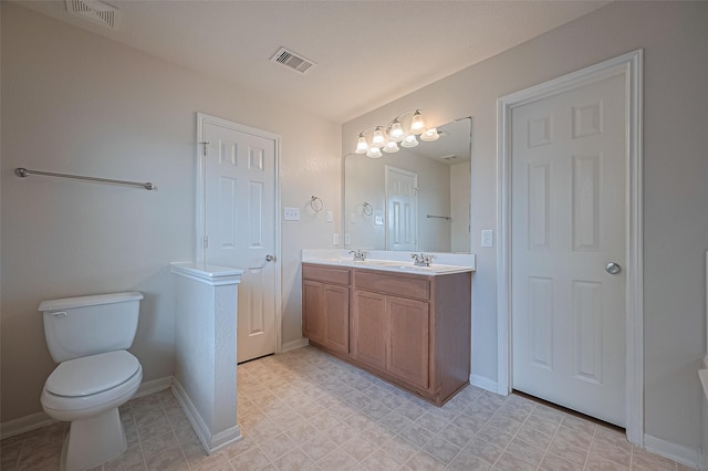 18231 Rexine Ln, Cypress, TX 77433 - bathroom featuring double vanity and baseboards