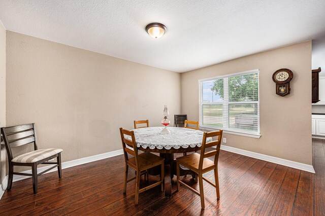 7403 Falcon Dr, Brookshire, TX 77423 - dining room featuring dark wood-style flooring and baseboards