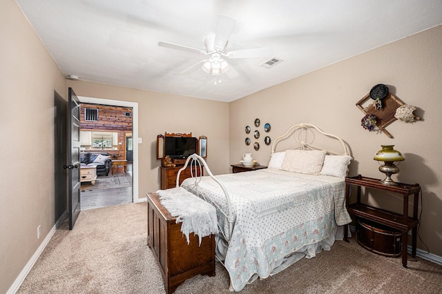 7403 Falcon Dr, Brookshire, TX 77423 - carpeted bedroom with baseboards and ceiling fan