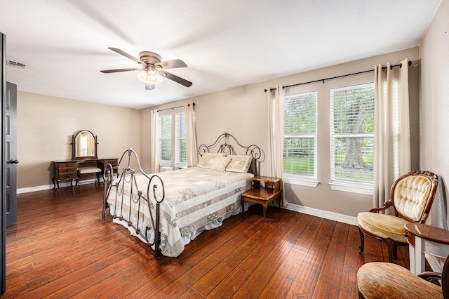 7403 Falcon Dr, Brookshire, TX 77423 - bedroom featuring dark wood finished floors and ceiling fan