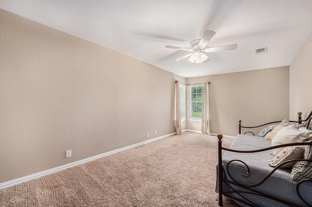 7403 Falcon Dr, Brookshire, TX 77423 - bedroom with carpet and ceiling fan