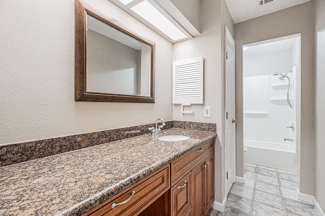 334 Anchor Way, League City, TX 77573 - bathroom with vanity,  shower combination, and stone tile flooring