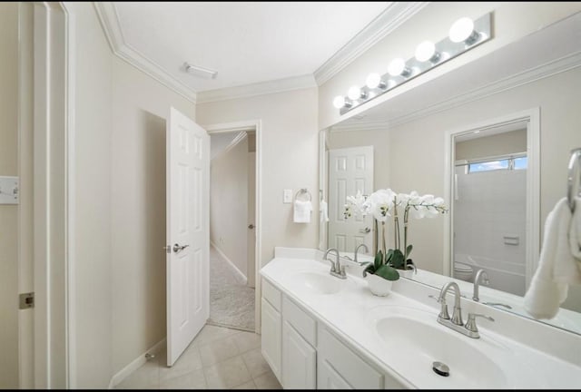 8123 Spring Bluebonnet Dr, Sugar Land, TX 77479 - full bath featuring double vanity, crown molding, tile patterned flooring, and bathtub / shower combination