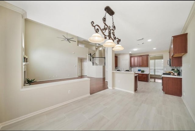 8123 Spring Bluebonnet Dr, Sugar Land, TX 77479 - kitchen featuring open floor plan, light countertops, pendant lighting, a ceiling fan, and recessed lighting