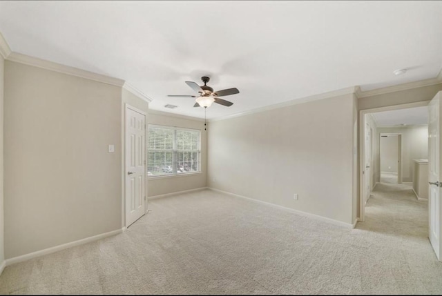 8123 Spring Bluebonnet Dr, Sugar Land, TX 77479 - unfurnished room with light carpet, a ceiling fan, crown molding, and a smoke detector