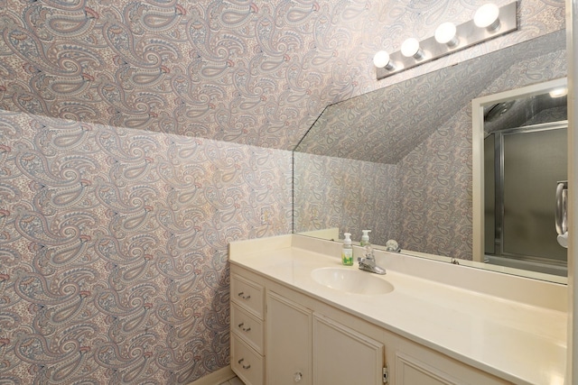 1311 Linwood Dr, Wharton, TX 77488 - bathroom featuring wallpapered walls, vanity, and an enclosed shower