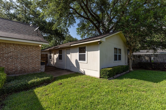 1311 Linwood Dr, Wharton, TX 77488 - back of house featuring brick siding
