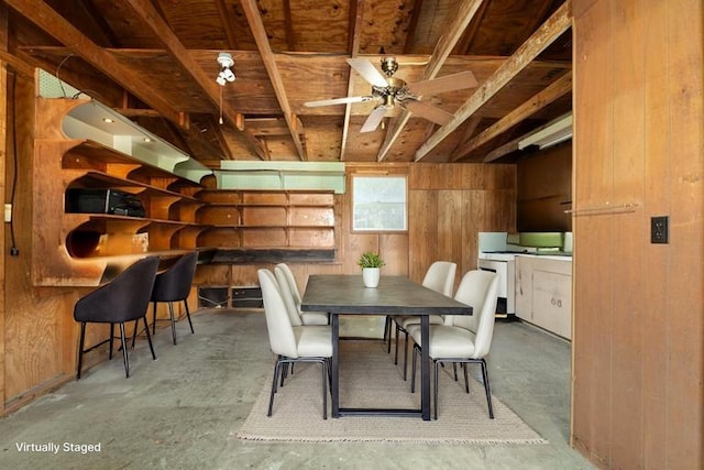 1311 Linwood Dr, Wharton, TX 77488 - dining area with wood walls, concrete floors, and ceiling fan