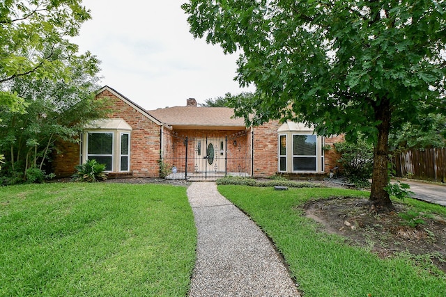 11103 Pembridge Dr, Houston, TX 77071 - single story home featuring brick siding and a chimney
