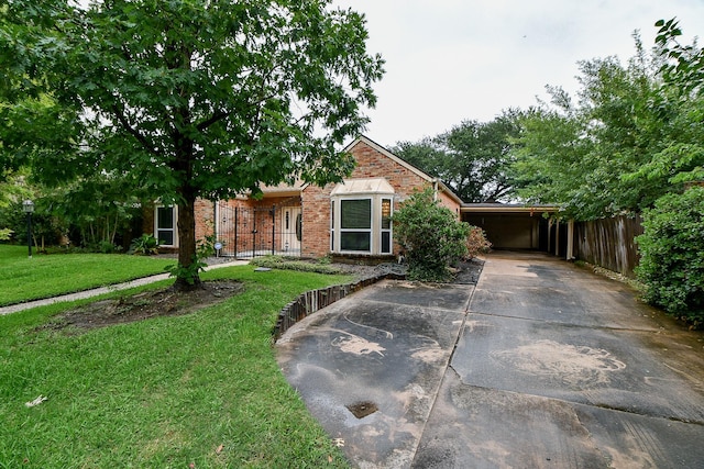 11103 Pembridge Dr, Houston, TX 77071 - view of front of property with driveway, brick siding, and an attached carport