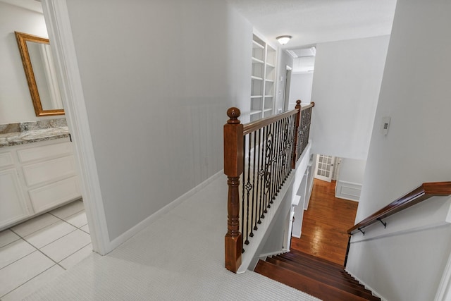 15902 Ivy Bridge Ln, Houston, TX 77095 - stairway featuring wood finished floors and baseboards
