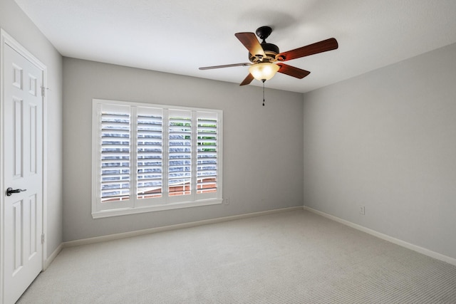 15902 Ivy Bridge Ln, Houston, TX 77095 - carpeted spare room featuring a ceiling fan and baseboards