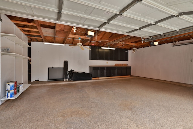 15902 Ivy Bridge Ln, Houston, TX 77095 - garage featuring a garage door opener and a ceiling fan