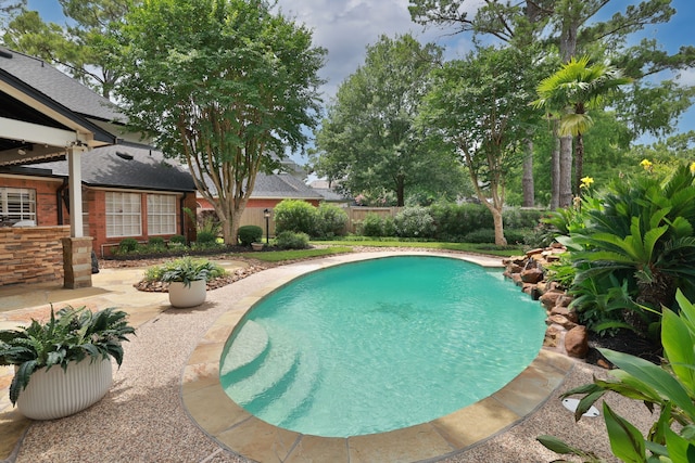 15902 Ivy Bridge Ln, Houston, TX 77095 - view of swimming pool featuring a fenced backyard and a patio