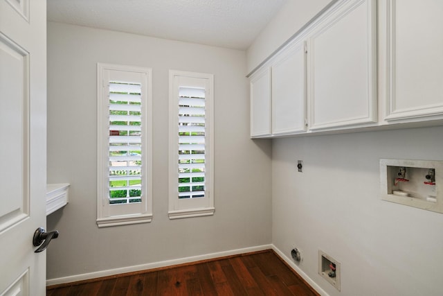 15902 Ivy Bridge Ln, Houston, TX 77095 - laundry area featuring hookup for an electric dryer, cabinet space, washer hookup, dark wood finished floors, and plenty of natural light
