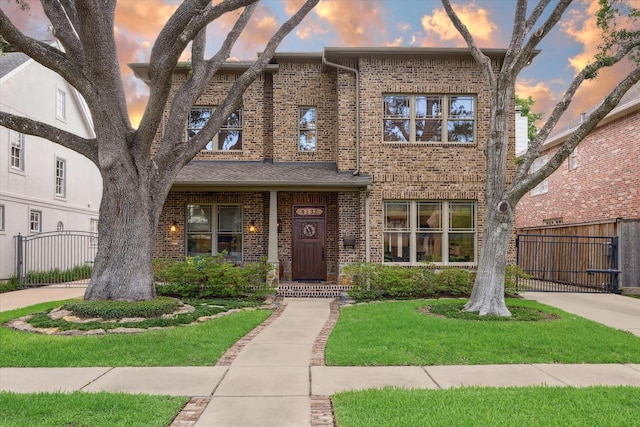 4132 Coleridge St, Houston, TX 77005 - view of front facade featuring brick siding and a gate