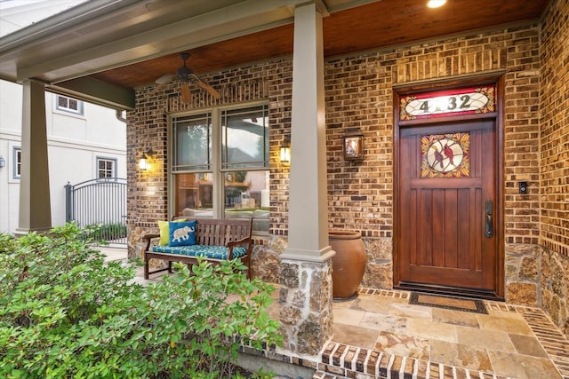 4132 Coleridge St, Houston, TX 77005 - entrance to property with covered porch, a ceiling fan, and brick siding