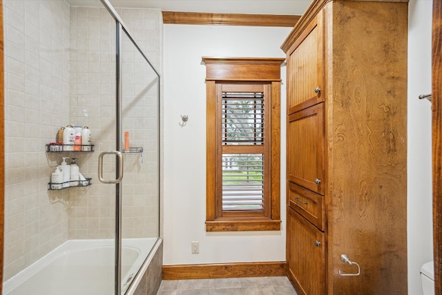 4132 Coleridge St, Houston, TX 77005 - bathroom featuring tile patterned floors, combined bath / shower with glass door, and ornamental molding