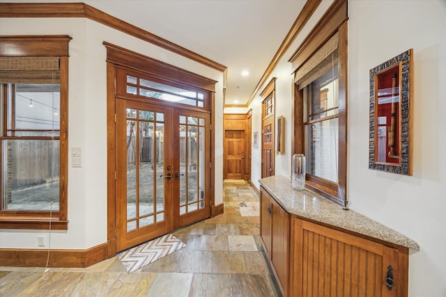 4132 Coleridge St, Houston, TX 77005 - foyer entrance with french doors, stone tile flooring, and crown molding