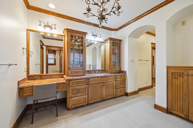 4132 Coleridge St, Houston, TX 77005 - full bath with ornamental molding, double vanity, and a chandelier