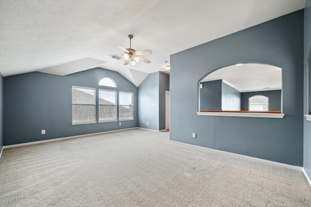 20202 Windsor Trace Ln, Richmond, TX 77407 - carpeted empty room with a ceiling fan and vaulted ceiling
