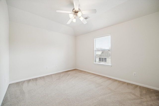 20202 Windsor Trace Ln, Richmond, TX 77407 - empty room featuring light colored carpet, ceiling fan, and vaulted ceiling