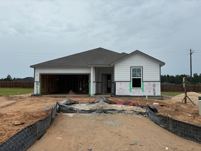 25408 Blossom Ct, Montgomery, TX 77316 - unfinished property with a garage and a shingled roof