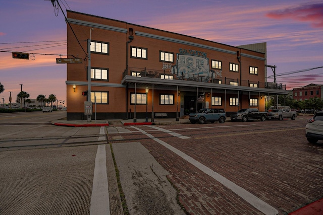 104 Moody Ave Unit 313, Galveston, TX 77550 - view of property at dusk