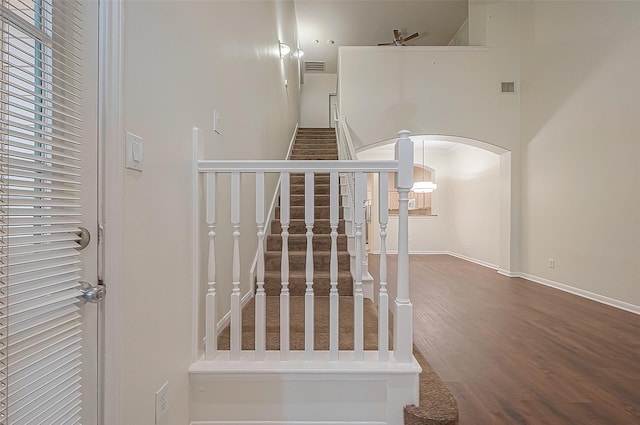 2710 Grants Lake Blvd Unit T6, Sugar Land, TX 77479 - stairs with arched walkways and wood finished floors