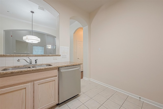 2710 Grants Lake Blvd Unit T6, Sugar Land, TX 77479 - kitchen featuring stainless steel dishwasher, light tile patterned flooring, crown molding, and decorative light fixtures