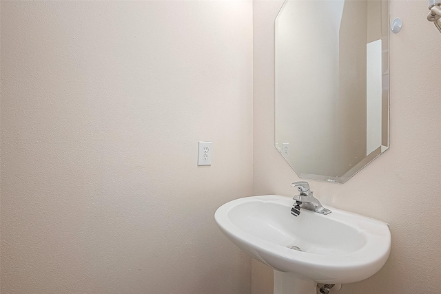 2710 Grants Lake Blvd Unit T6, Sugar Land, TX 77479 - bathroom featuring a sink