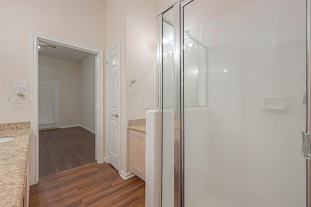 2710 Grants Lake Blvd Unit T6, Sugar Land, TX 77479 - bathroom featuring wood finished floors, vanity, and a shower stall