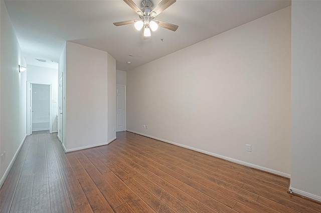 2710 Grants Lake Blvd Unit T6, Sugar Land, TX 77479 - spare room with dark wood-style floors and a ceiling fan